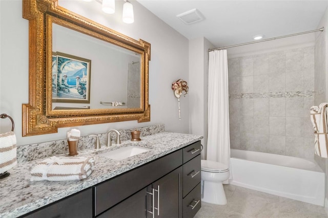 full bathroom with tile patterned floors, shower / bath combination with curtain, toilet, and vanity