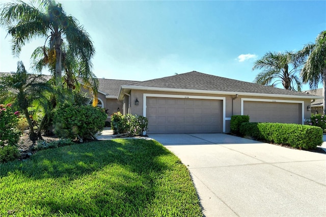 single story home featuring a garage