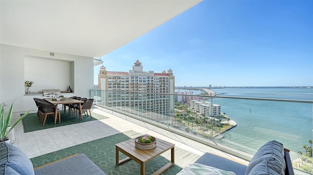 balcony featuring a water view