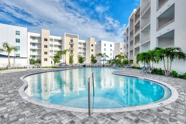 view of pool featuring a patio area