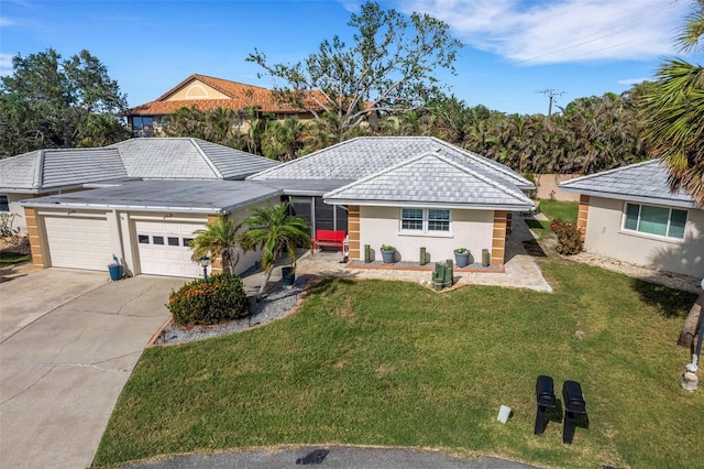 single story home with a garage and a front yard