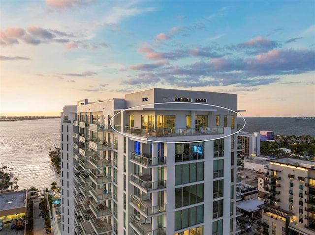 outdoor building at dusk with a water view