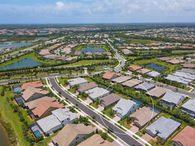 aerial view featuring a water view