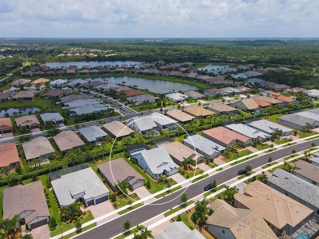 drone / aerial view with a water view