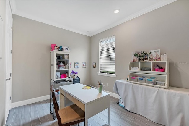 office space featuring hardwood / wood-style flooring and crown molding