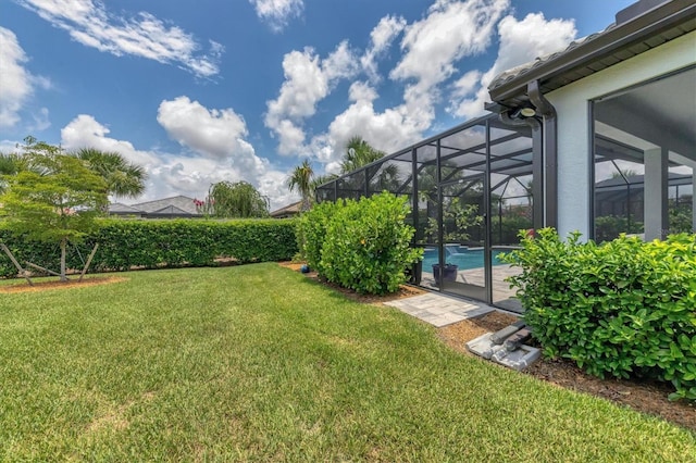 view of yard featuring a lanai