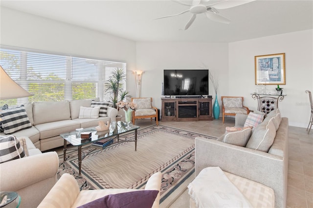 tiled living room featuring ceiling fan