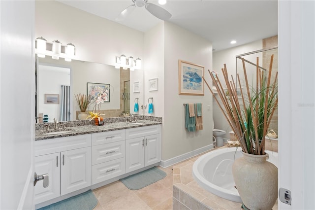 full bathroom with vanity, ceiling fan, tile patterned flooring, shower with separate bathtub, and toilet