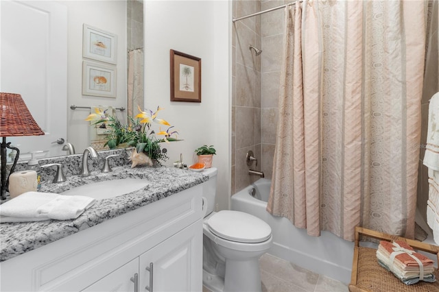 full bathroom featuring toilet, vanity, tile patterned floors, and shower / tub combo with curtain