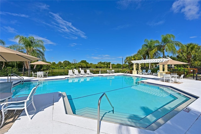 view of swimming pool featuring a patio