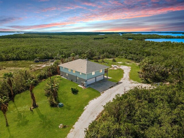 445 Horseshoe Loop Rd, Terra Ceia, FL 34250 - view of subject property featuring a forest and a large body of water