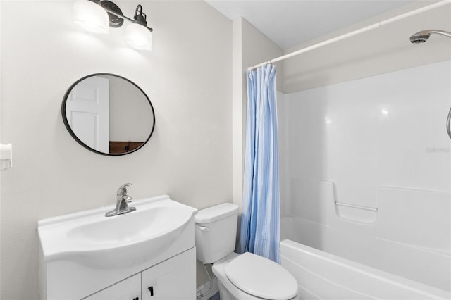 full bathroom with vanity, shower / bath combination with curtain, and toilet