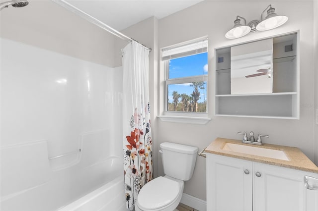 445 Horseshoe Loop Rd, Terra Ceia, FL 34250 - full bathroom featuring vanity, toilet, shower / tub combo, and baseboards