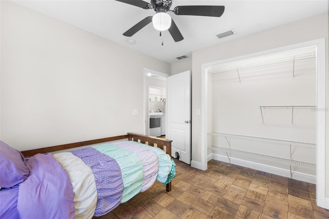 bedroom featuring ceiling fan, parquet floors, and a closet