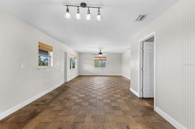 spare room with ceiling fan