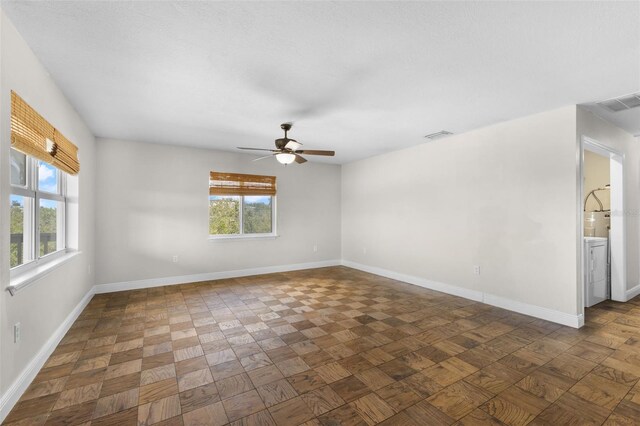 445 Horseshoe Loop Rd, Terra Ceia, FL 34250 - spare room with healthy amount of natural light, ceiling fan, and baseboards