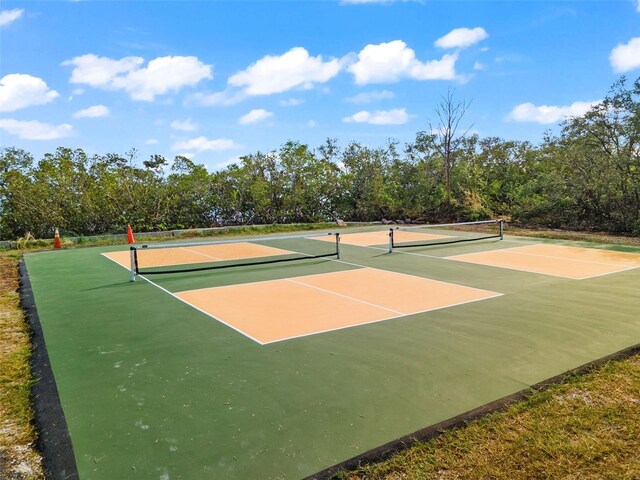 445 Horseshoe Loop Rd, Terra Ceia, FL 34250 - view of tennis court featuring community basketball court