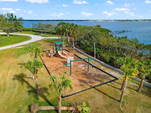 birds eye view of property with a water view