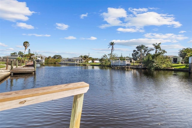 view of dock with a water view