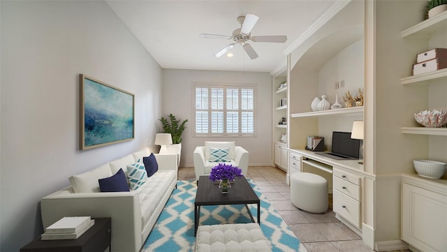 tiled living room featuring ceiling fan and crown molding