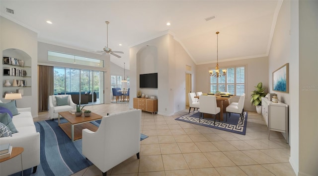 tiled living room featuring ceiling fan with notable chandelier, high vaulted ceiling, plenty of natural light, and crown molding