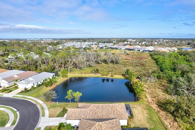 drone / aerial view with a water view