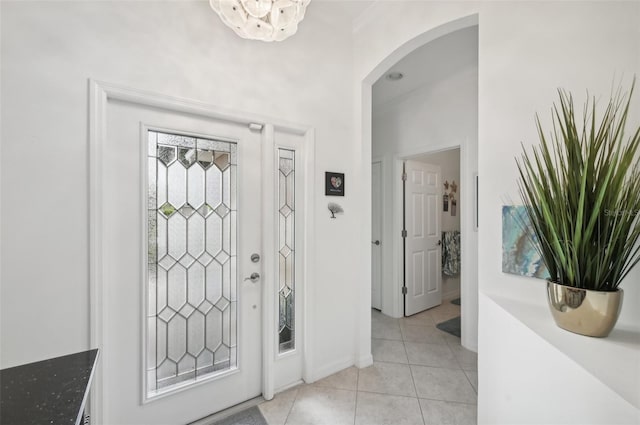 foyer entrance with light tile patterned flooring