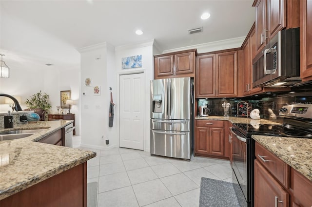 kitchen featuring sink, tasteful backsplash, light stone counters, crown molding, and appliances with stainless steel finishes