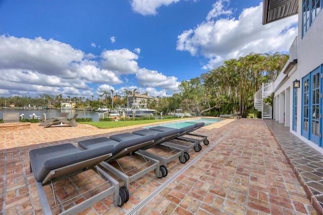 view of patio / terrace featuring a water view