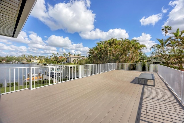 wooden deck with a water view