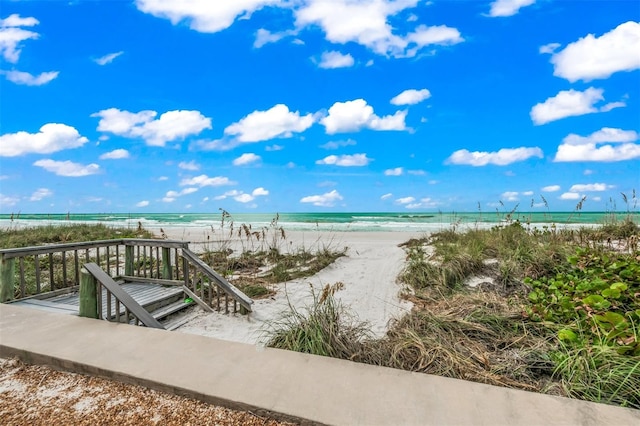 view of water feature with a beach view