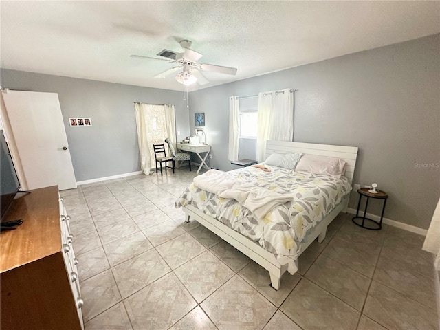 108 Shell Rd, Venice, FL 34293 - bedroom with light tile patterned floors, ceiling fan, and baseboards