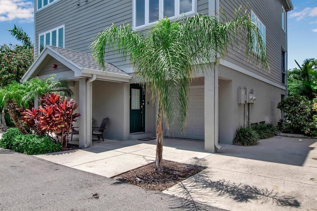 exterior space with a garage