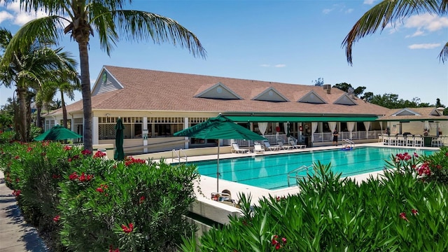 view of pool featuring a patio