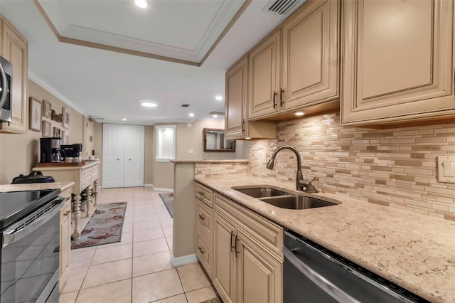 4119 61st Avenue Terrace W Unit 105, Bradenton, FL 34210 - kitchen featuring appliances with stainless steel finishes, a sink, cream cabinetry, light tile patterned floors, and backsplash
