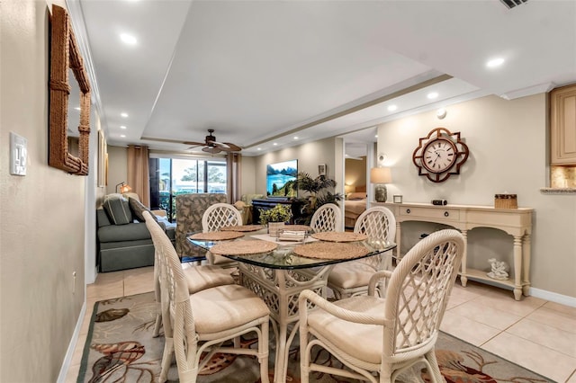 4119 61st Avenue Terrace W Unit 105, Bradenton, FL 34210 - dining room with light tile patterned flooring, baseboards, ceiling fan, recessed lighting, and a tray ceiling