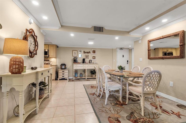 4119 61st Avenue Terrace W Unit 105, Bradenton, FL 34210 - dining space with crown molding, recessed lighting, light tile patterned floors, and baseboards