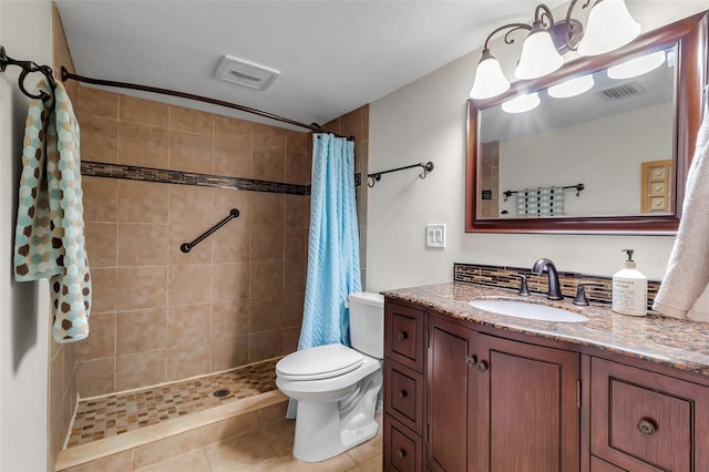 4119 61st Avenue Terrace W Unit 105, Bradenton, FL 34210 - full bath featuring vanity, toilet, a tile shower, and tile patterned floors