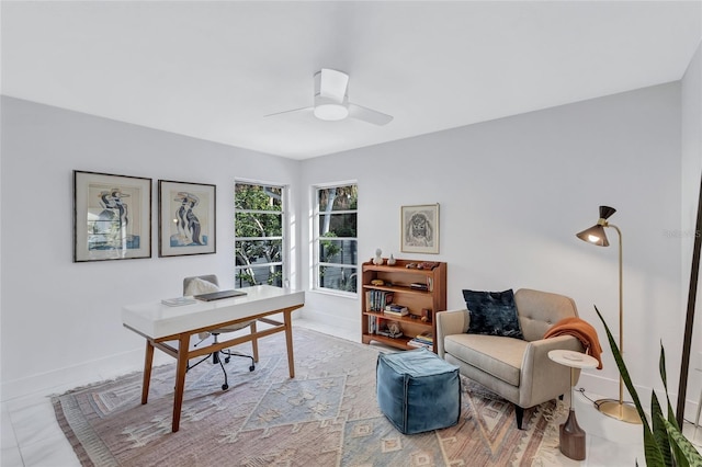 tiled home office with ceiling fan