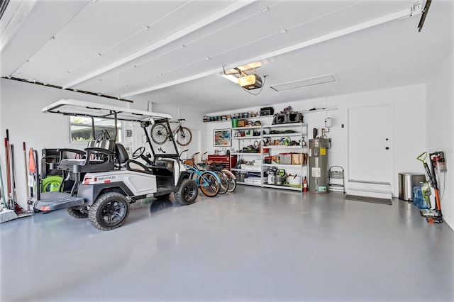 garage featuring electric water heater and a garage door opener