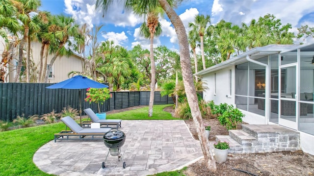 view of patio / terrace with a sunroom