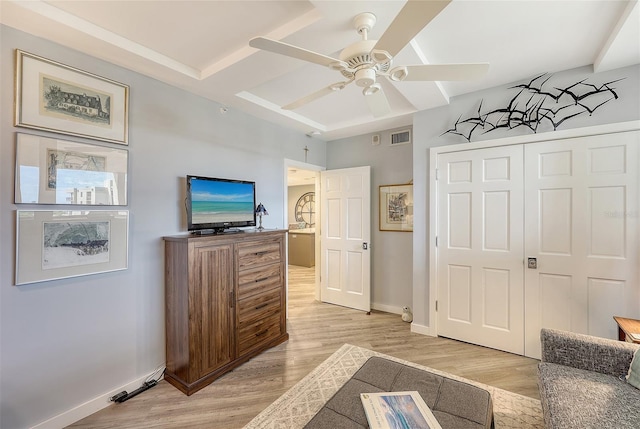 interior space with ceiling fan and light hardwood / wood-style flooring