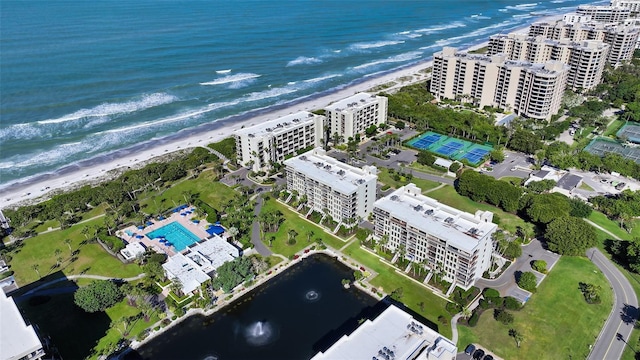 aerial view featuring a water view and a view of the beach