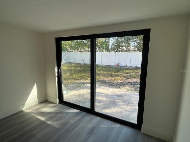 doorway featuring hardwood / wood-style floors