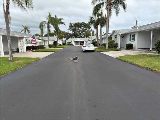 view of road with a residential view