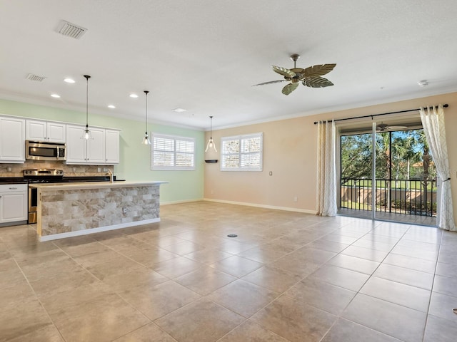 8133 Miramar Way Unit 201, Lakewood Ranch, FL 34202 - kitchen featuring appliances with stainless steel finishes, ornamental molding, tasteful backsplash, light tile patterned flooring, and a ceiling fan