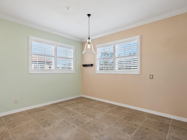8133 Miramar Way Unit 201, Lakewood Ranch, FL 34202 - unfurnished room featuring healthy amount of natural light, crown molding, fire sprinkler in ceiling, and tile patterned flooring
