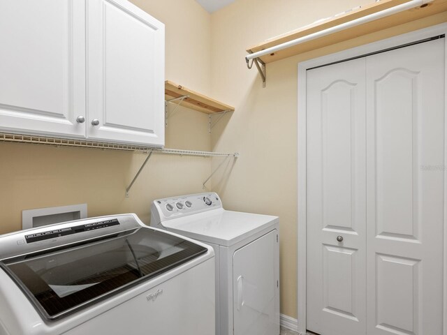 8133 Miramar Way Unit 201, Lakewood Ranch, FL 34202 - laundry room with separate washer and dryer and cabinet space