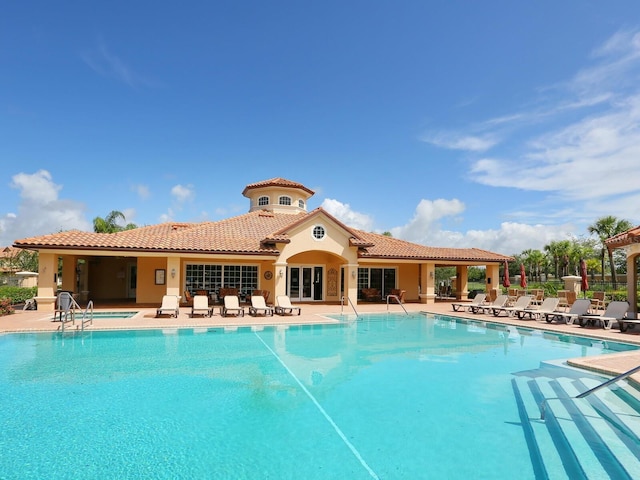 8133 Miramar Way Unit 201, Lakewood Ranch, FL 34202 - community pool featuring a patio and a community hot tub