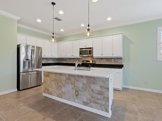8133 Miramar Way Unit 201, Lakewood Ranch, FL 34202 - kitchen featuring stainless steel appliances, ornamental molding, white cabinetry, tasteful backsplash, and hanging light fixtures